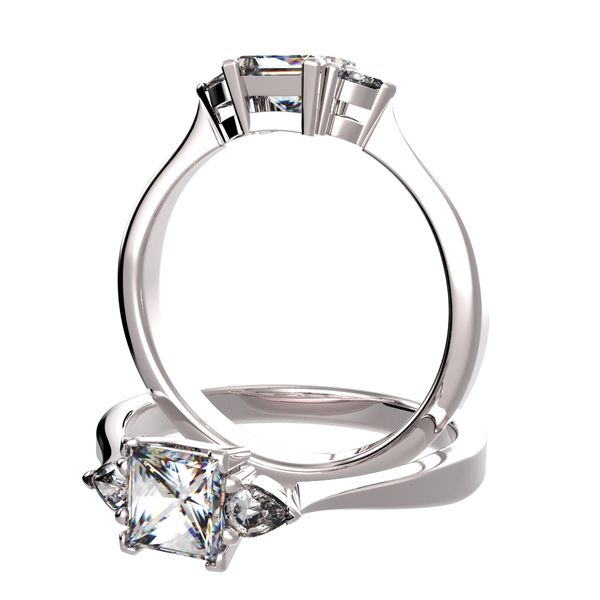 Anillo acompañado con 2 diamantes peras